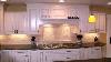 Antique White Kitchen Cabinets With Dark Granite Countertops
